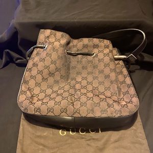 Gucci used small , drawstring bag authentic